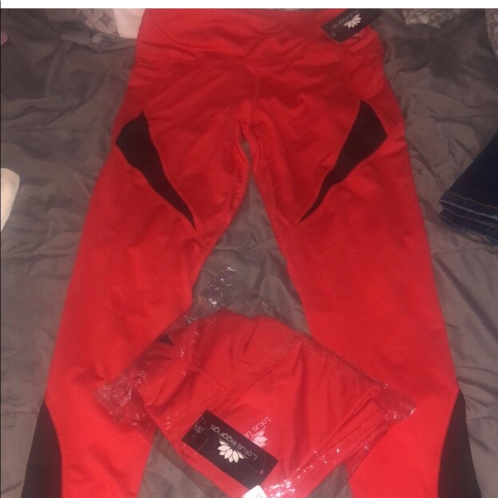 Red with black mesh yoga pants.